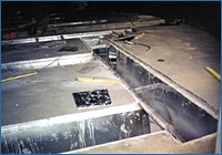 Air blowing grain cooler with pre-built channels in silos or hangar